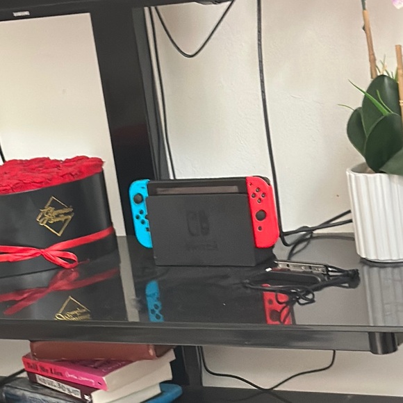 Nintendo Switch with Vibrant Red and Blue Controllers